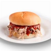 Pulled Pork · Served with BBQ sauce. Slow smoked pork paired with BBQ sauce.