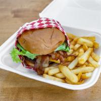 Western Bacon Burger · Mouthwatering Crispy fried onions on top of
a juicy Angus beef patty, with bacon, avocado
an...