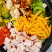 Cobb Salad · Layers of chopped romaine lettuce, juicy
chicken breast diced turkey boiled egg crispy
bacon...