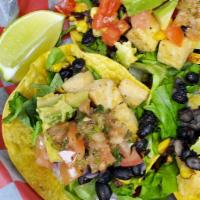 Vegan Tacos · Three tacos packed with black beans, Pico de Gallo,
avocado, tofu, shredded lettuce, corn an...