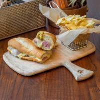 Linguica    Sandwich · Sausage, Muenster cheese, mustard, farofa, and vinaigrette sauce on white baguette.