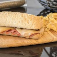Misto Quent · Ham and cheese on butter bread.