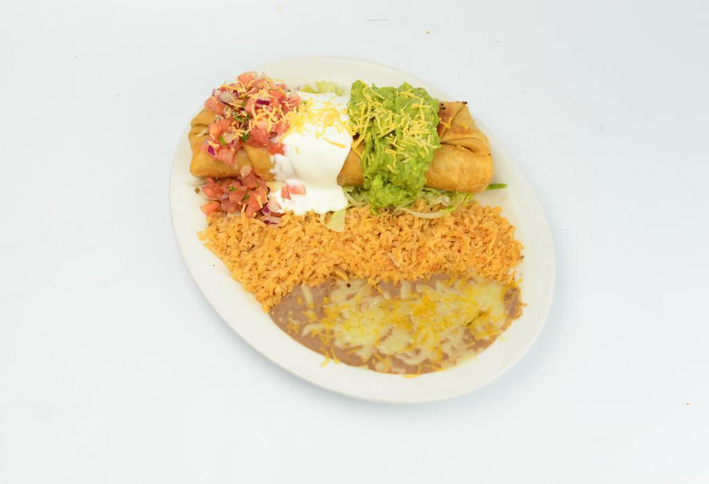 Chimichanga Deep Fried Burrito · Choice of meat, rice, beans, topped with sour cream, guacamole and salsa.