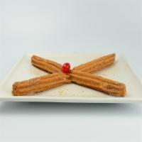 Churros · Deep fried pastry strips, rolled in sugar and cinnamon. 