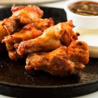 BBQ Tossed Wings 6 Pieces · 