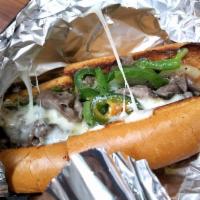 Philly Cheesesteak Sandwich · Roast beef, sauteed onions, bell peppers, jalapenos, mayo, mozzarella.