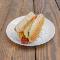 Chicago Dog · Vienna beef cooked to perfection served on a poppy seed bun with a pickle spear, dash of cel...