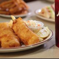 Fish & Chips · Our own hand-dipped cod fillets served with french fries and coleslaw.