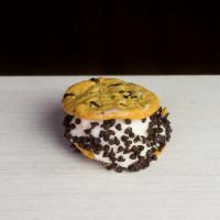 Ice Cream Cookie Sandwich · A scoop of Old Fashioned Vanilla Ice Cream between two chocolate chip cookies, then pressed ...