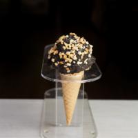 Ice Cream Sundae Cone · A scoop of Old Fashioned Vanilla on top of a sugar cone, dipped in chocolate and sprinkled w...