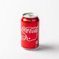 Coke · 12 oz can of Coke.