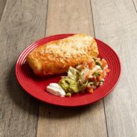 Chimichanga · Fried flour tortilla stuffed with your choice of meats, rice, beans, and topped with rancher...