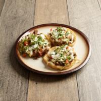 Sopes · Order of 3 pieces with spread beans, topped with your choice of meat, with lettuce, cilantro...