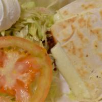 Kid's Quesadillas · Flour tortilla with cheese and lettuce.