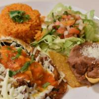 Chile Relleno · Sweet poblano pepper stuffed with your choice of meat or cheese with rice, beans, and corn t...
