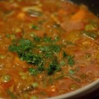 27. Sabzi Kolhapuri · Mix vegetable cooked with vapor pressure flavored with fresh coriander and aromatic spice. V...