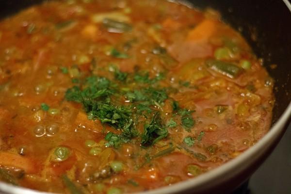 27. Sabzi Kolhapuri · Mix vegetable cooked with vapor pressure flavored with fresh coriander and aromatic spice. Vegetarian.