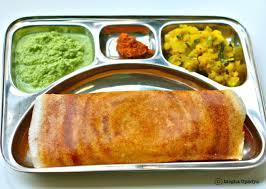 86. Masala Dosa · Thin rice crepe stuffed with delicious herb, potato
 and onion.