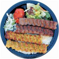 14. Lula Combination · Beef and chicken lula combination served with basmati rice, green salad, broiled tomato, sli...