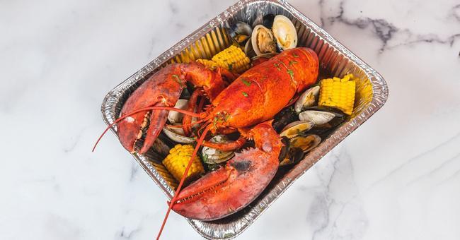 Lobster Bake for 2 (2.5 lb lobster) · Fresh steamed north-Atlantic lobster, clams, mussels, chorizo, potatoes & corn-on-the-cobb served in a rich seafood broth (serves 2)