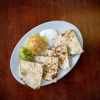 Kids Chicken Quesadilla · Served with rice and refried beans. 