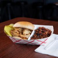 Pulled Chicken Sandwich · Slow smoked chicken seasoned in our house blend rub.  Sauce served on the side.