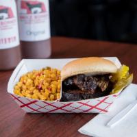 Brisket Sandwich · Beef brisket rubbed down with a Texas style rub.  Then cooked over a wood fire of oak wood. ...