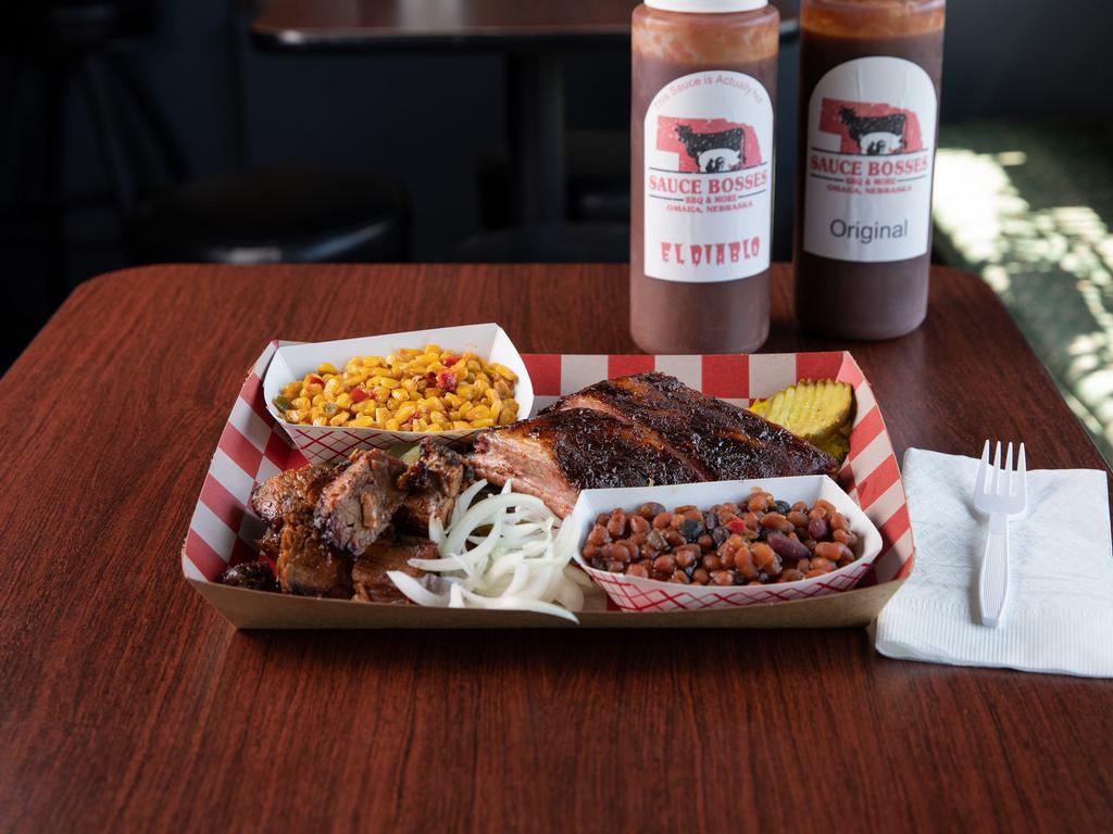 Ribs and Meat plate · Get 1/3 rack of ribs and a meat option of your choice.  Also choose 2 of our sides.  