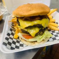 Bacon Cheese Double Boss Burger · Homemade patties, slices of bacon, American cheese, lettuce, grilled onions, pickles and tom...