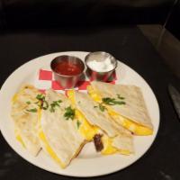 Quesadilla · Add chicken or steak for an additional charge.