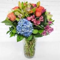 Summer Garden · This elegant design is bursting with color and unforgettable flowers! Design may vary in col...