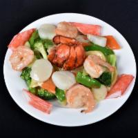 C19. Seafood Delight · Lobster meat, scallops, and jumbo shrimp sauteed with assorted Chinese vegetables.