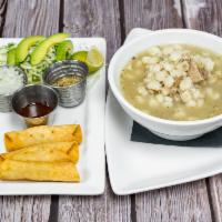 Pozole Soup · White broth, pork, corn, lime, cabbage, avocado. Comes with taquitos on the side. 