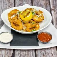 Fried Breaded Calamari  · Comes with house made red sauce and creamy mild habanero sance.