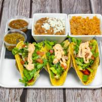 Traditional Tacos · Choice of; steak, chicken, or shrimp. Comes with pico de gallo, rice and beans.