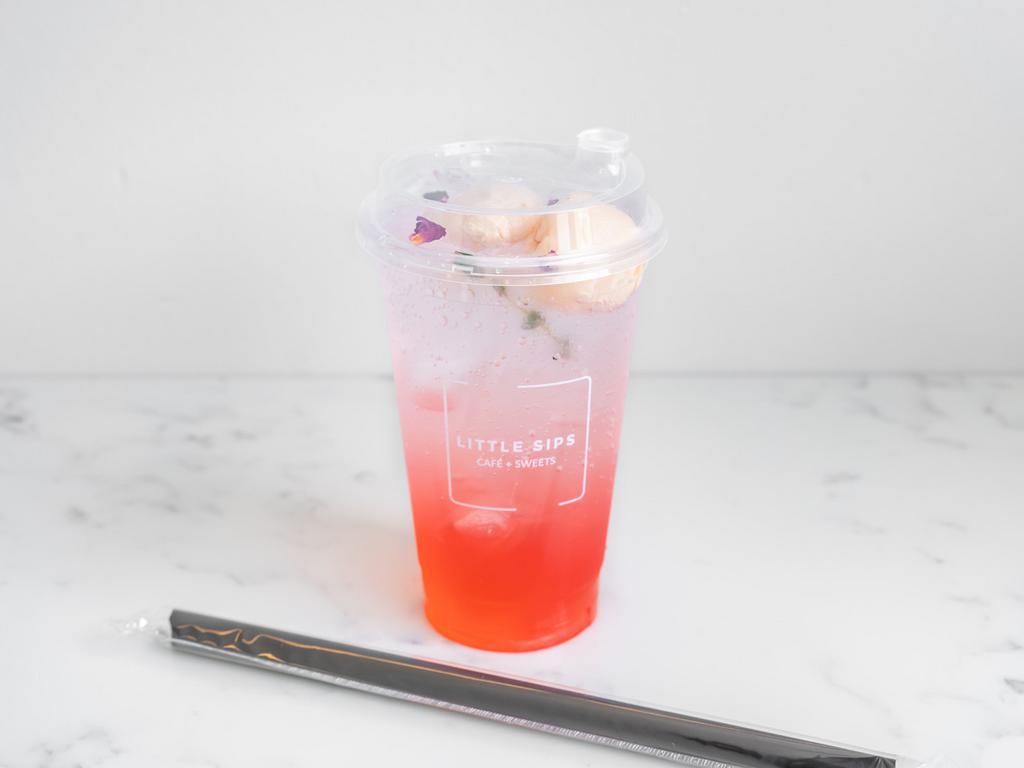 Lychee Rose Soda · Lychee, rose syrup, club soda, thyme. Please shake well before drinking.