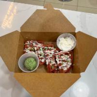 Red Velvet Mochi Waffle · Grapes, Cream cheese sauce, Sprinkles, House made Matcha ice cream