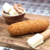 1/2 Mozza and 1/2 Hot Dog · This is made fresh with 1/2 mozzarella - 1/2 meat sausage and breaded with our special dough...