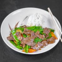 Beef with Snow Peas · Served with rice or fried rice.