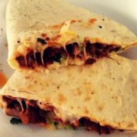 Quesadilla de Adobada · Marinated pork.