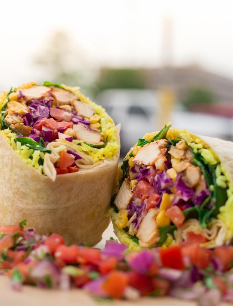 Burrito · Burrito with many choices of bases, proteins, sauces, topping and finishing sauces.