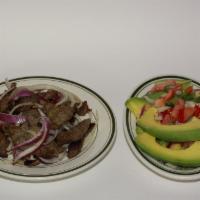 Pepper Steak (Filetillo de Res) · Juicy cut steak with onions and peppers carne de res picado con pimiento y cebolla
