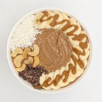 Chocolate Nice Cream Cacao Bowl · Tastes like a frosty. Blend: bananas, cacao powder, local honey, snd coconut milk. Toppings:...