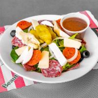 Cold Antipasto Salad · Chopped cured meats, fresh cheeses, and briny olives.