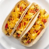 B-Fast Tacos Breakfast · Lean ground turkey and eggs on a corn tortilla topped with pico de gallo and cheese.