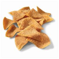 Cinnamon Chips · Our crispy tortilla chips are freshly fried and are loaded up with a mix of cinnamon and sug...
