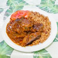Brown Stew Chicken · Served with steamed vegetables and one choice of side.
