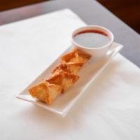 Crab Rangoon · Deep-fried wonton wrap filled with crab and cream cheese, with mango chili dipping sauce