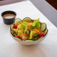Mandarin Salad · Romaine lettuce, cucumber, mandarin oranges, edamame beans, cherry tomatoes, and crunchy cho...