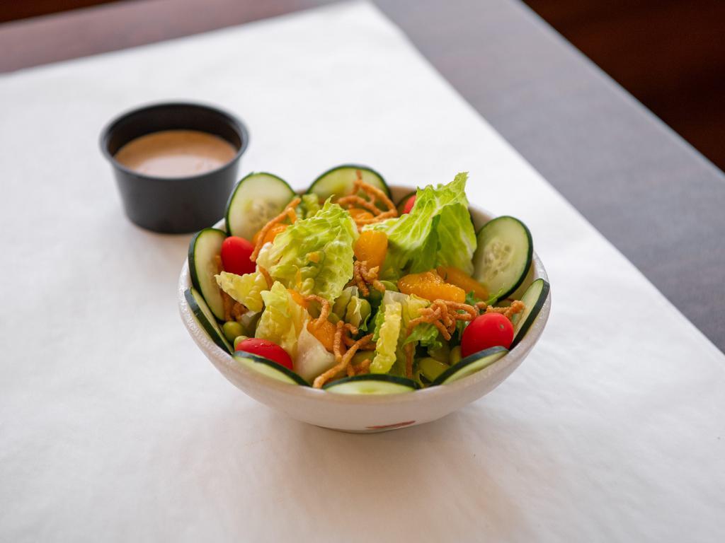 Mandarin Salad · Romaine lettuce, cucumber, mandarin oranges, edamame beans, cherry tomatoes, and crunchy chow mein noodle.  Recommended dressing:  Sesame